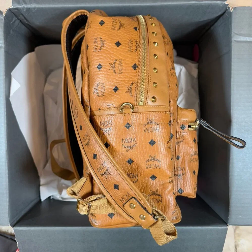 MCM Visetos Studded Medium Stark M Logo Collection Backpack Cognac Monogram